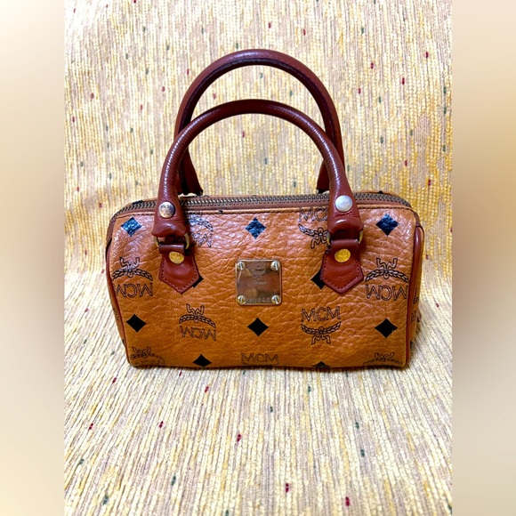 MCM Handbags - MCM AUTHENTICATED MINI VISETOS COGNAC BOSTON BAG. UEC. LIKE NEW. COMES WITH COA.